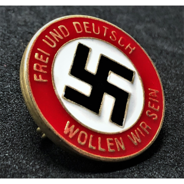 Badge We Wish to be Free and German