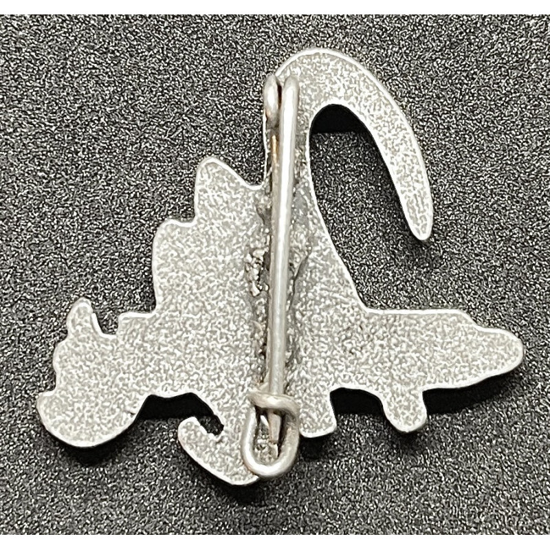 Small propaganda pin of the "M" Battalion